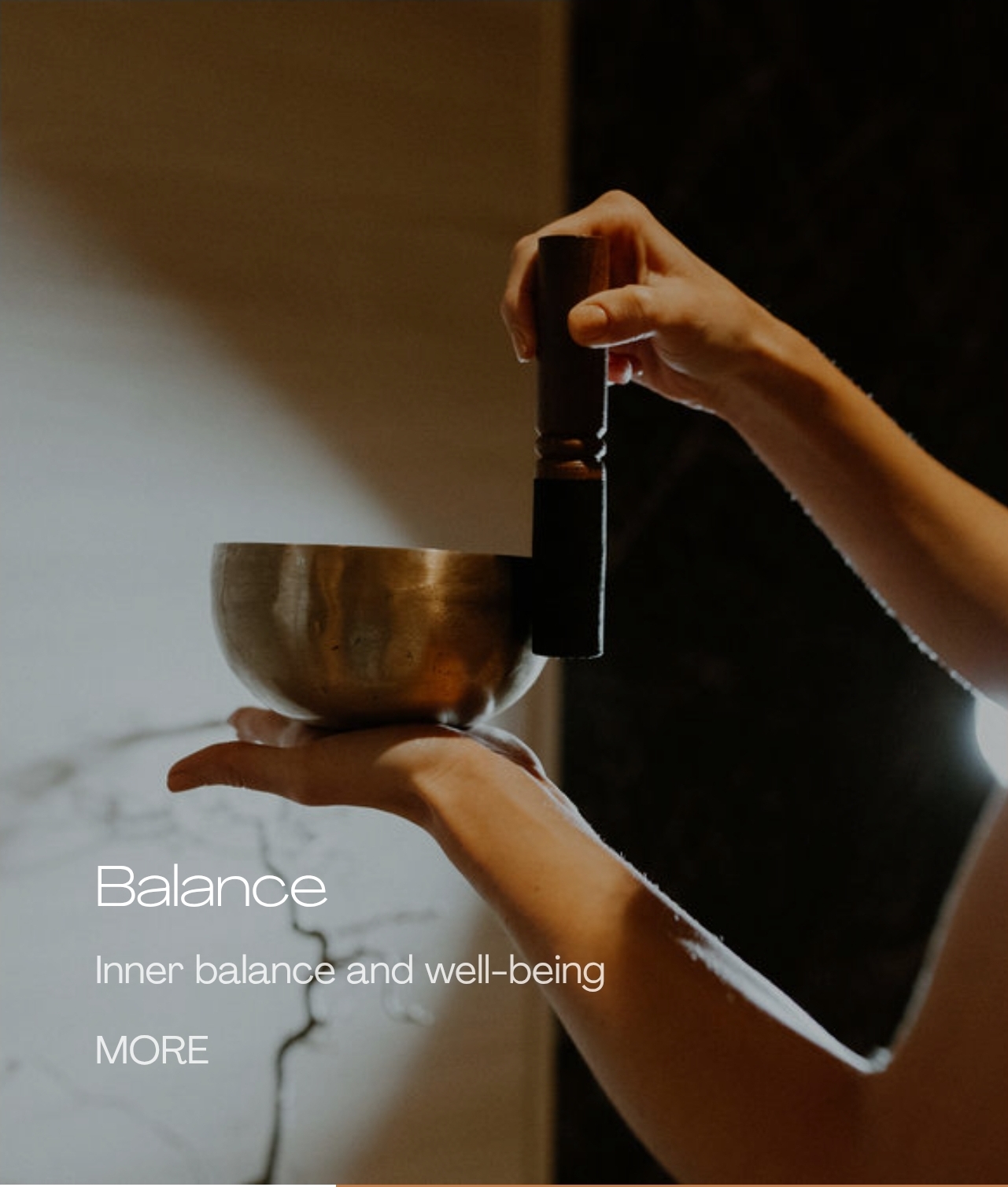 Singing bowl held during a Melea wellness ritual